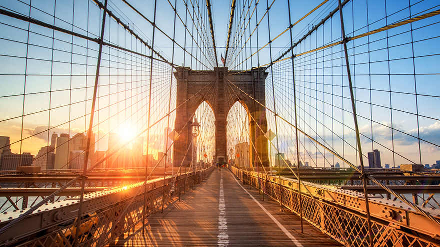 sunset view looking across the Brooklyn Bridge 