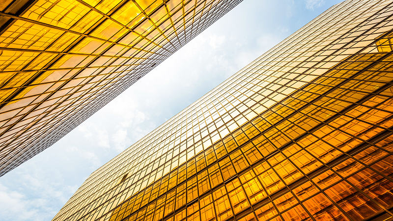 A unique camera angle photo showing modern architectural structure symbolizing innovation and leadership, featured on Apollo’s CEO Conference page highlighting strategic transformation and organizational growth across private equity and asset management.