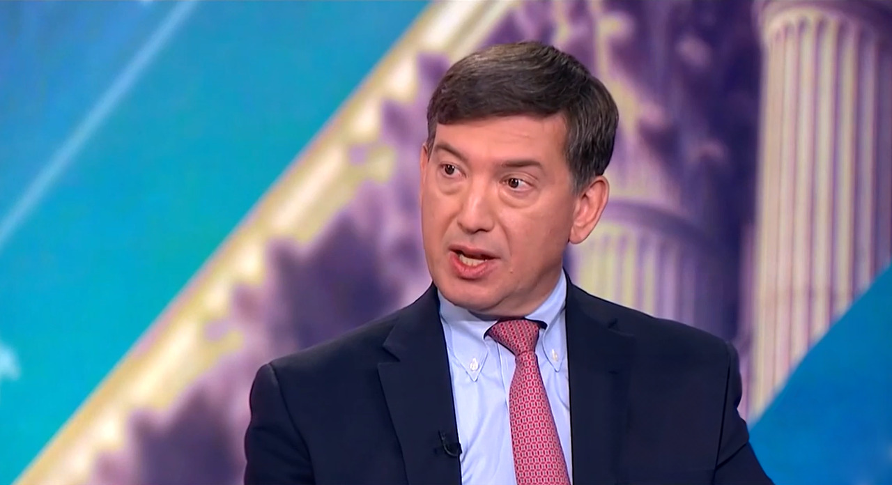 Scott Kleinman Discusses KDP Investment, PE Exit Environment and AI on Bloomberg Open Interest Apollo Co-President Scott Kleinman speaking during a televised interview, discussing private equity strategy against a backdrop featuring architectural columns and a stylized blue and purple gradient.