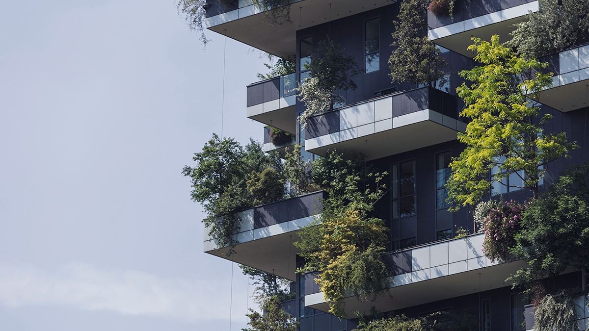 Contemporary building with terraces abundant in greenery, symbolizing dynamic, living growth—mirroring Apollo’s fresh re‑imagination of fixed income via private markets that generate impactful, high‑quality yield.